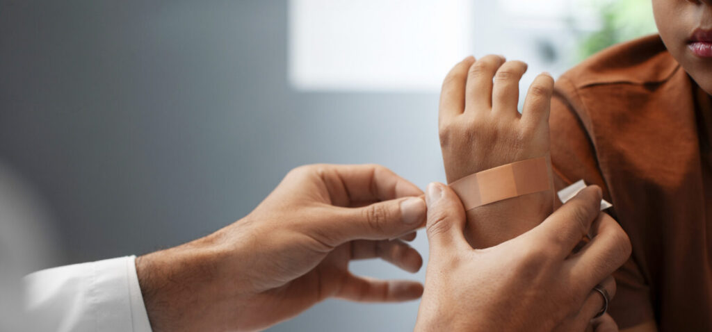 doctor taking care of an afro-american child
